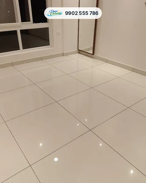 Spotless glossy white floor tiles in a bedroom with a tall mirror